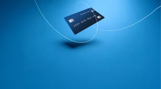 A credit card in a blue gradient background